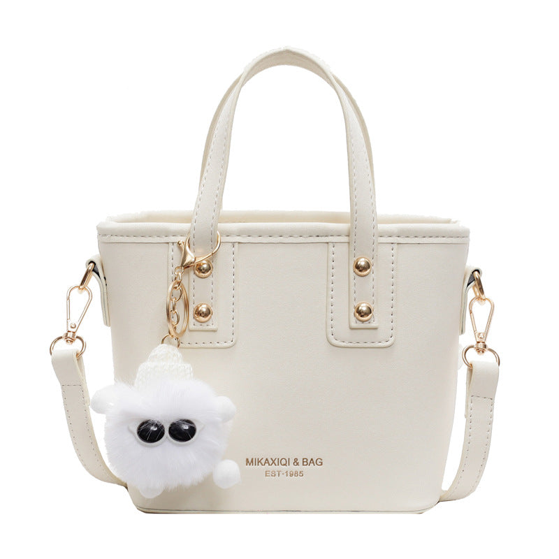 Women’s mini bag with detachable plush pendant