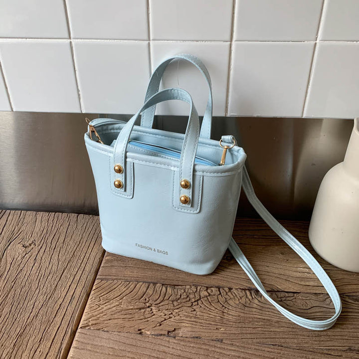Ladies Mini-Handbag with elegant carry handle and practical inner compartment