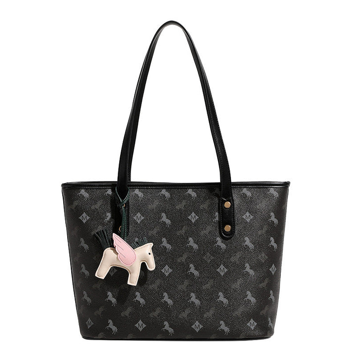 Women's casual tote bag with playful design and detachable pendant