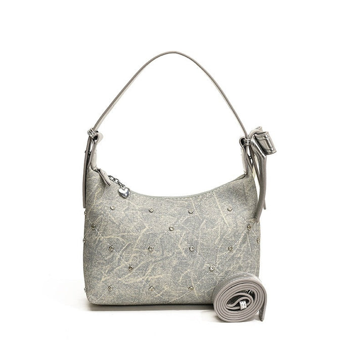 Ladies fashionable shoulder bag with sparkling appliqués