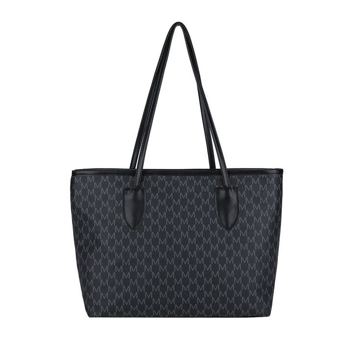 Ladies tote bag made of high-quality, durable material with elegant monogram