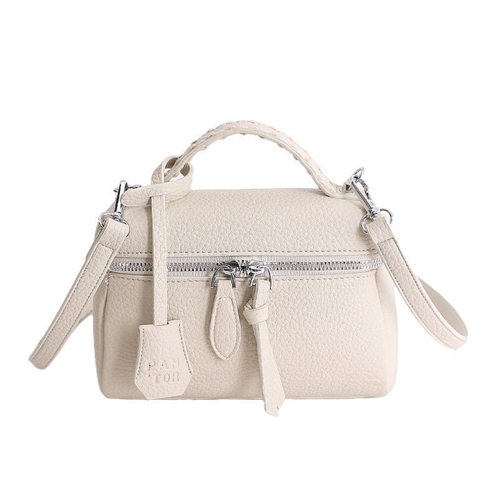 Women's mini handbag with fine decorative seams and detachable shoulder strap