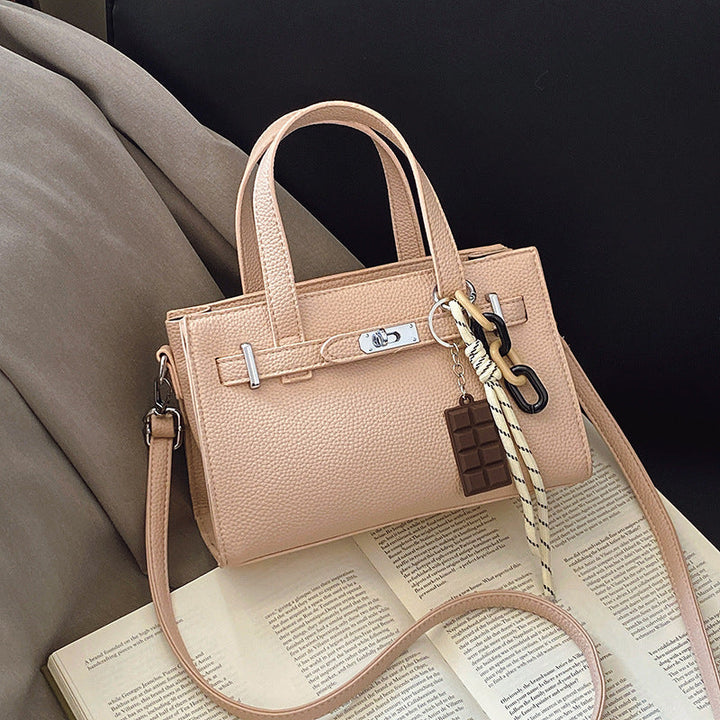 Ladies elegant mini bag with detachable pendant