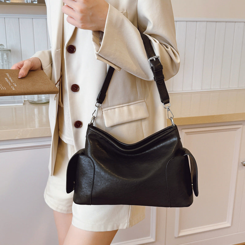 Women's shoulder bag made of high-quality synthetic leather with a stylish design