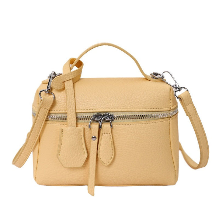 Women's practical shoulder bag with double zipper and versatile carrying strap