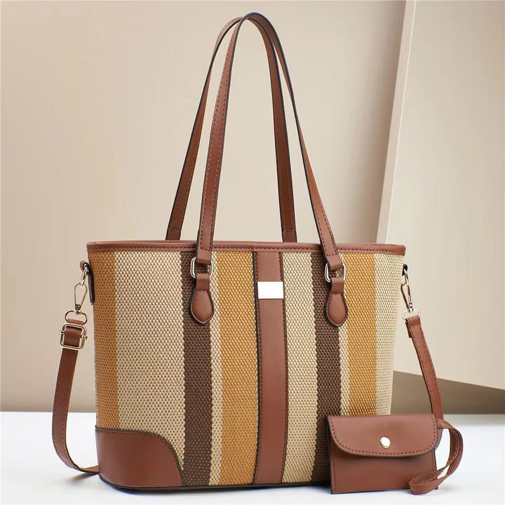 Women's tote bag with textured outer material and removable mini clutch