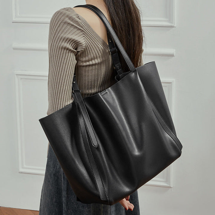 Women's tote bag with elegant design and removable shoulder strap