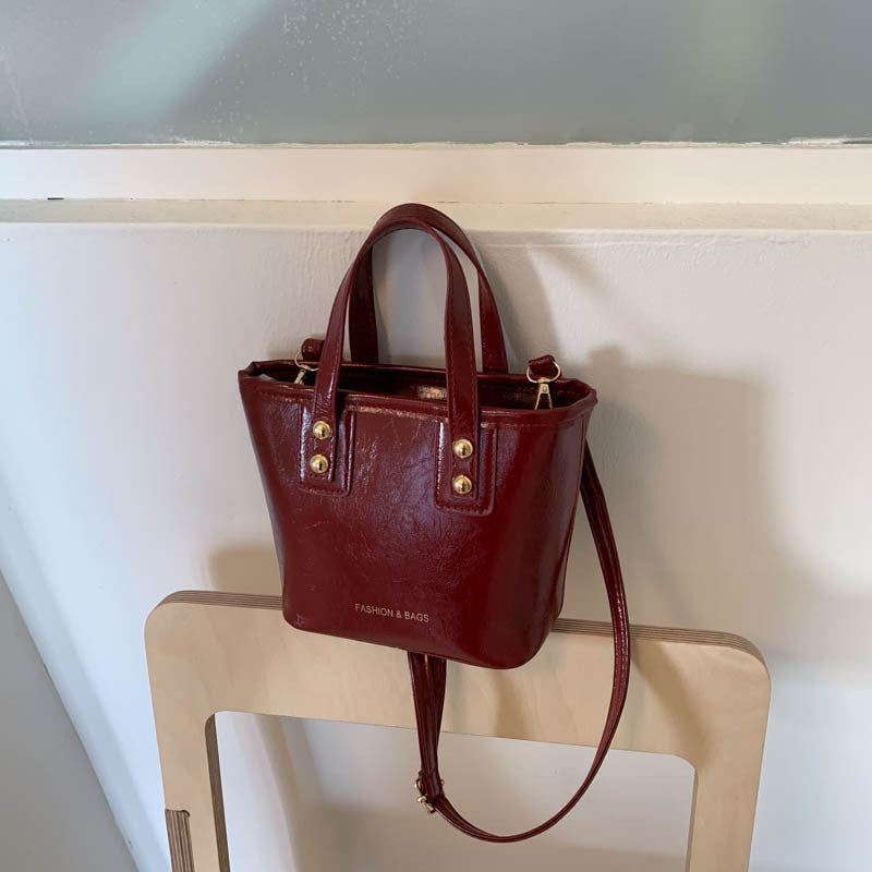 Women’s mini handbag with elegant chain closure