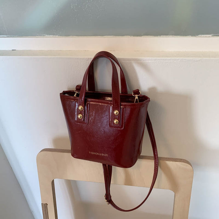 Women’s mini handbag with elegant chain closure