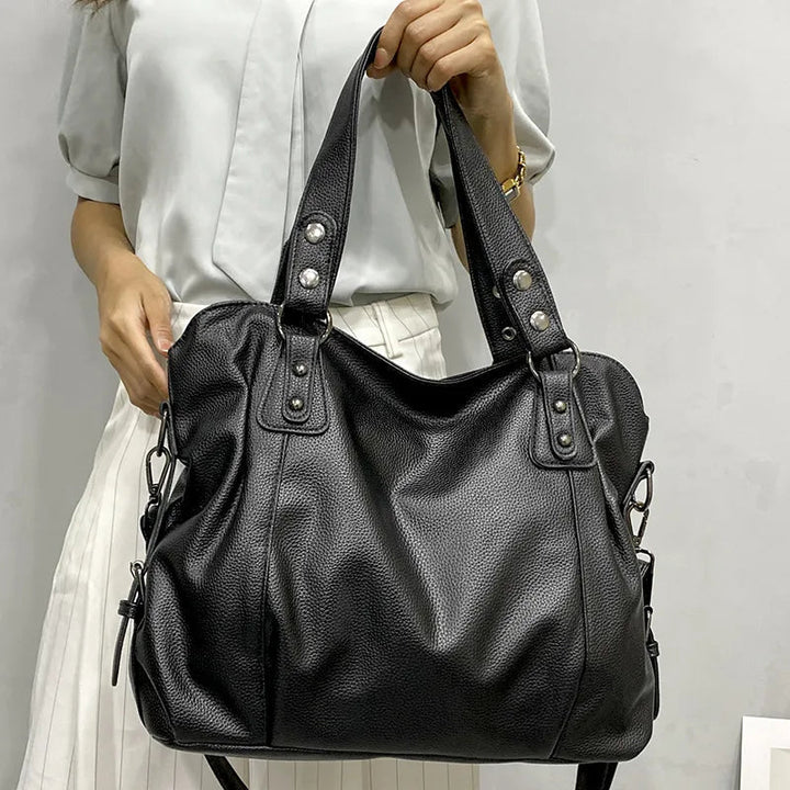 large women's tote bag made of faux leather with zipper